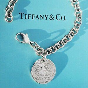 Tiffany & Co. - 7.5" Sterling Silver Charm Bracelet, Round Tag Notes Charm
